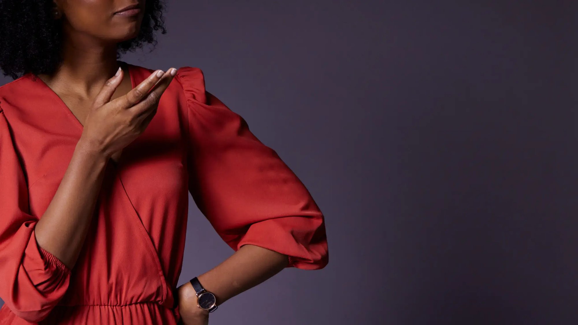 woman-with-red-dress-dark-background